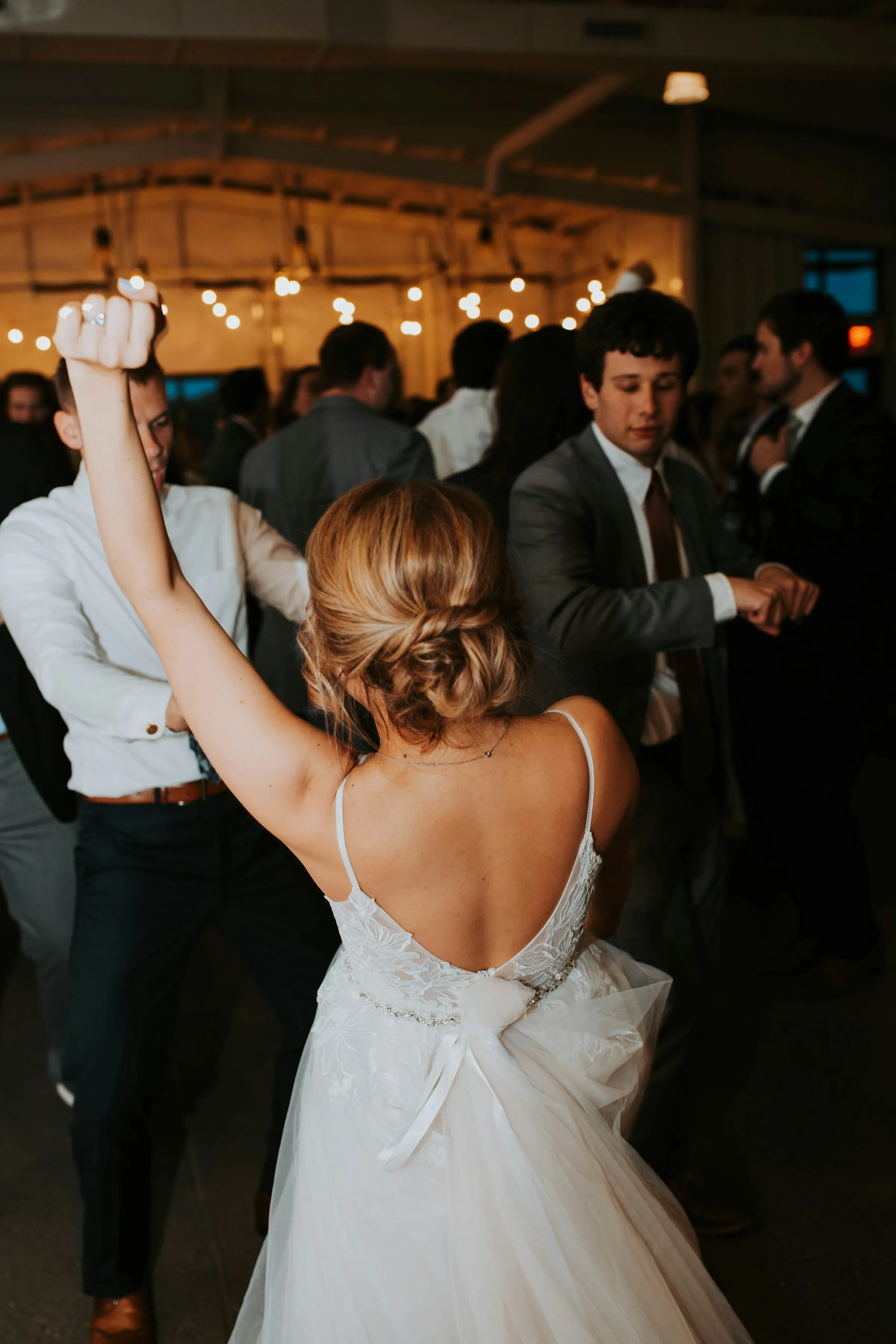 Photo of people dancing at a wedding